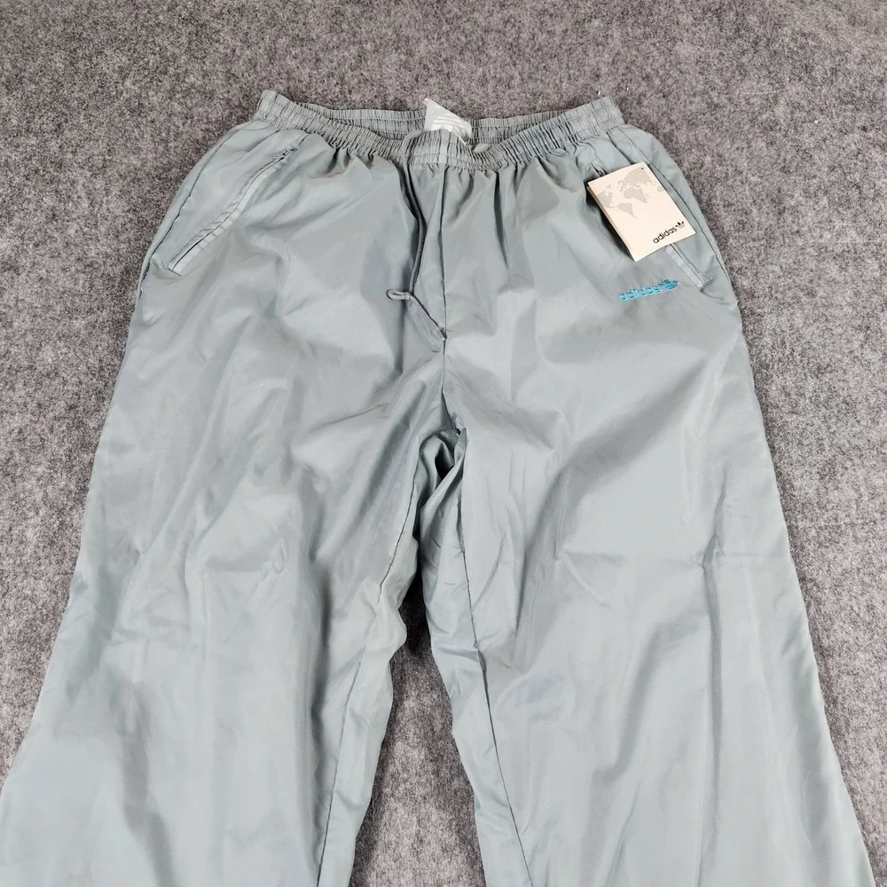 VTG NWT 80s 90 Adidas One World Track Pants Men L Blue Trefoil Nylon Windbreaker